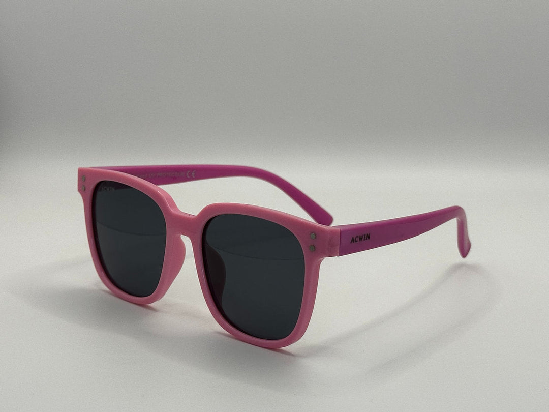 Gafas de sol infantiles ACWIN Alba en color rosa fucsia con montura cuadrada redondeada y lentes oscuras. - Vista 2