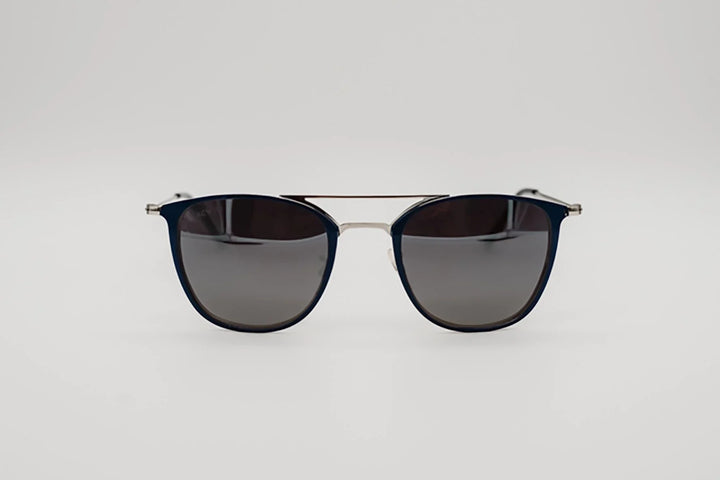Vista frontal gafas de sol Buenos Aires estilo aviador moderno con aros azules y metal plateado.