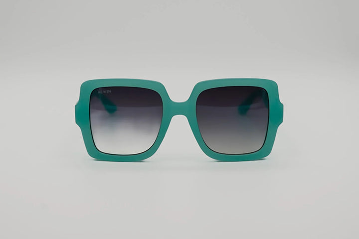 Vista frontal gafas de sol Burgos cuadradas oversize en color turquesa mate.