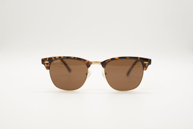 Vista frontal gafas de sol London estilo Clubmaster browline en carey y dorado.