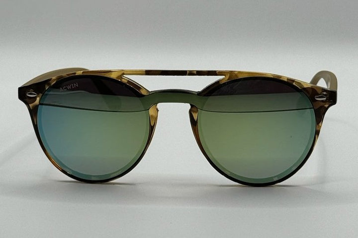 Vista frontal gafas de sol Maly redondas con doble puente carey y lentes espejo verde.