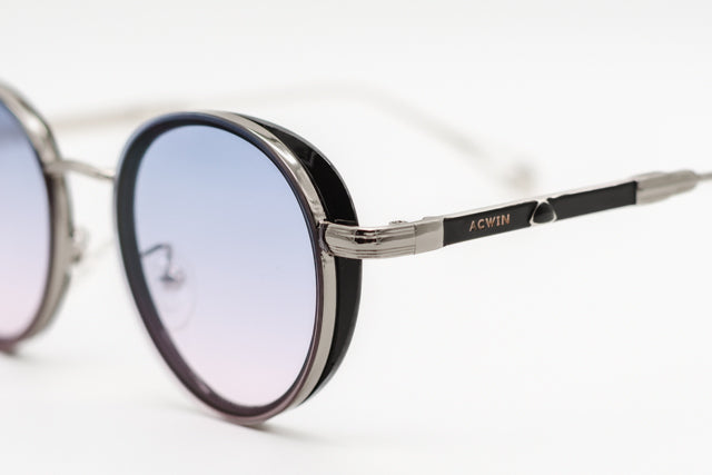 Detalle macro de la varilla metálica grabada y el aro Windsor negro del modelo Paris.