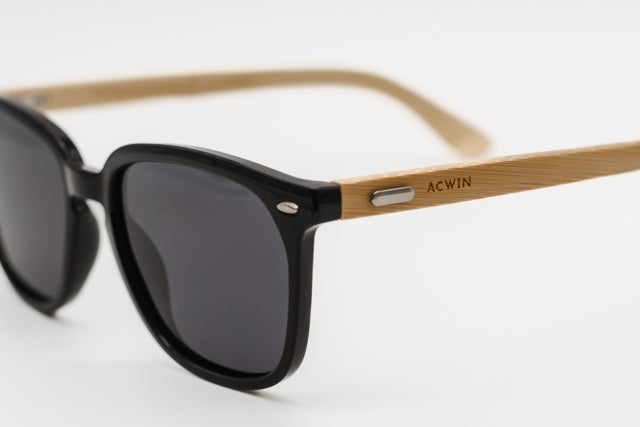 Detalle macro de la conexión entre el frontal negro y la varilla de madera del modelo Rio.