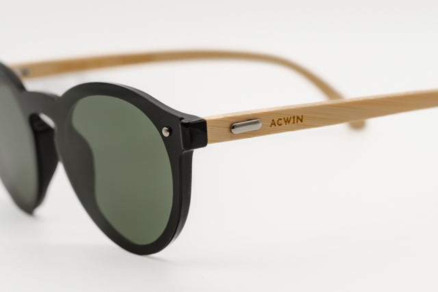 Detalle macro de la varilla de madera de bambú y frontal negro del modelo Seul.