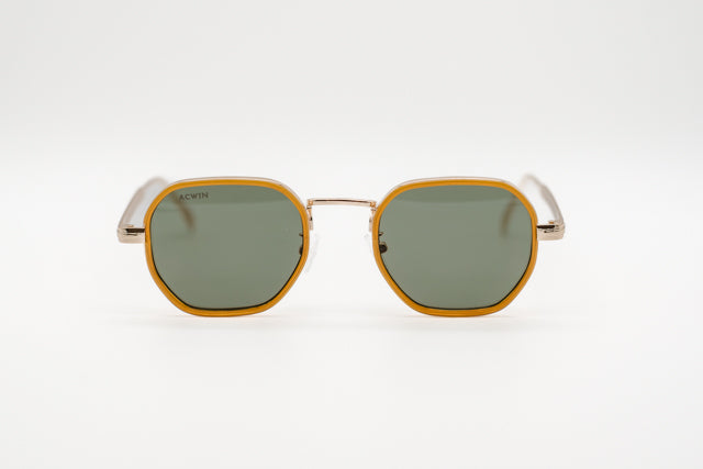 Vista en perspectiva gafas de sol Sidney octagonales de metal dorado y aro mostaza.