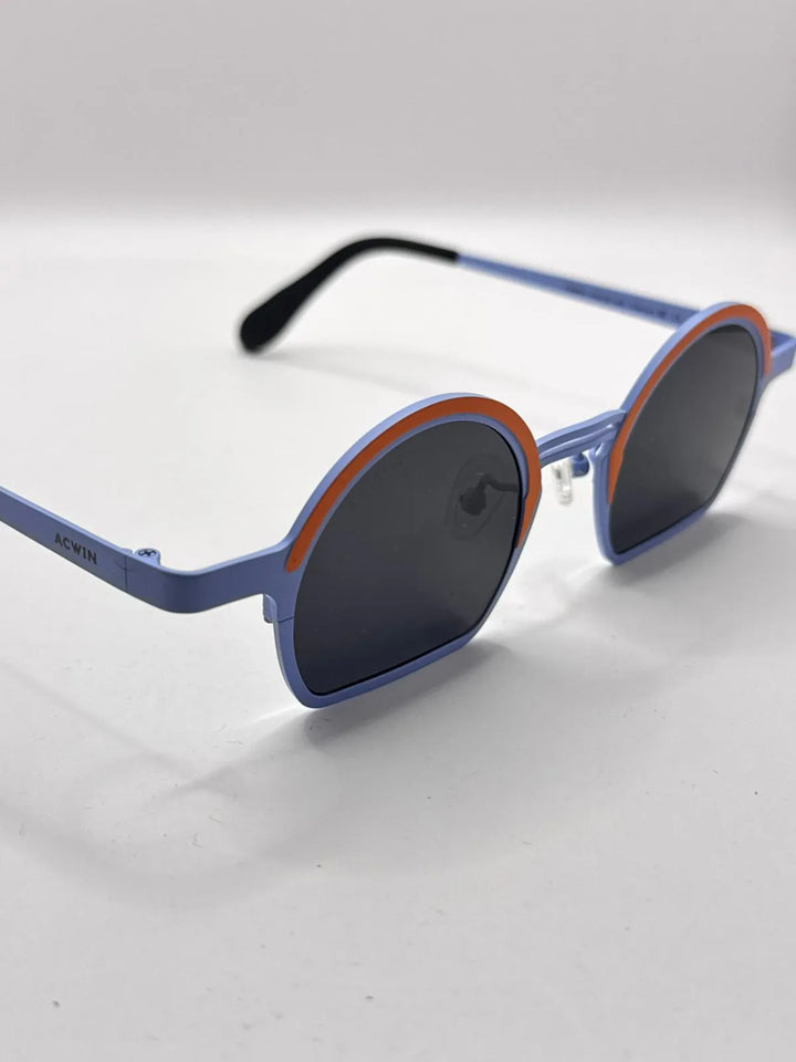 Gafas de sol Titanio Procida detalle con detalles naranja